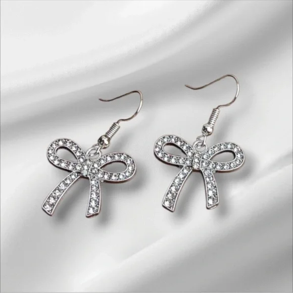 Elegant Silver Tone Bow Earrings - Picture 1 of 3